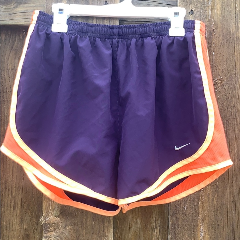 Purple and orange nike dri-fit running shorts